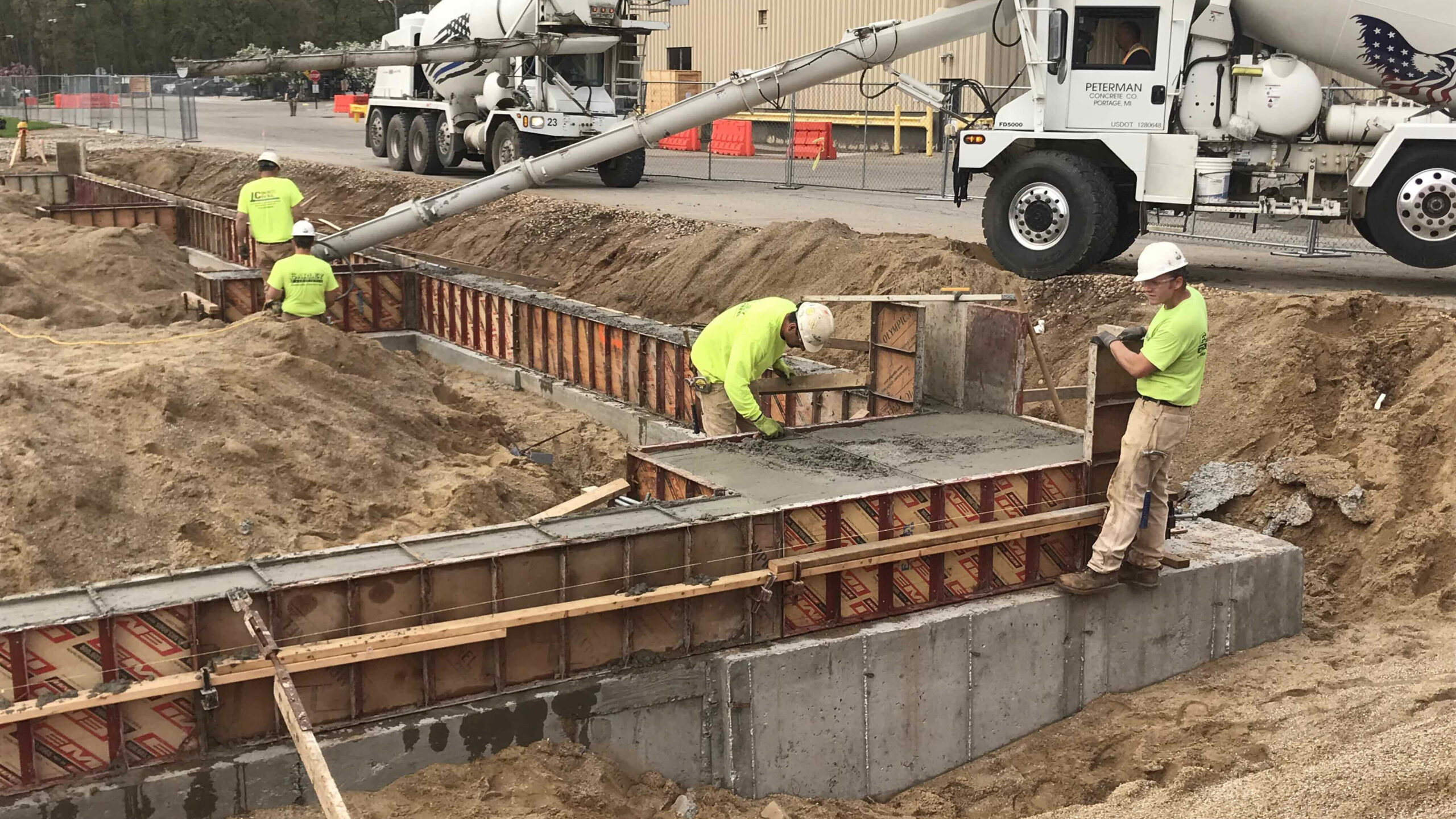 Active construction site - pouring concrete foundations.